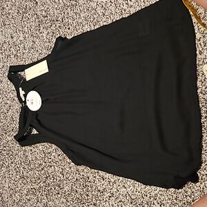 Michael Fashion. Black top sleeveless. Women's size Small. New with tags